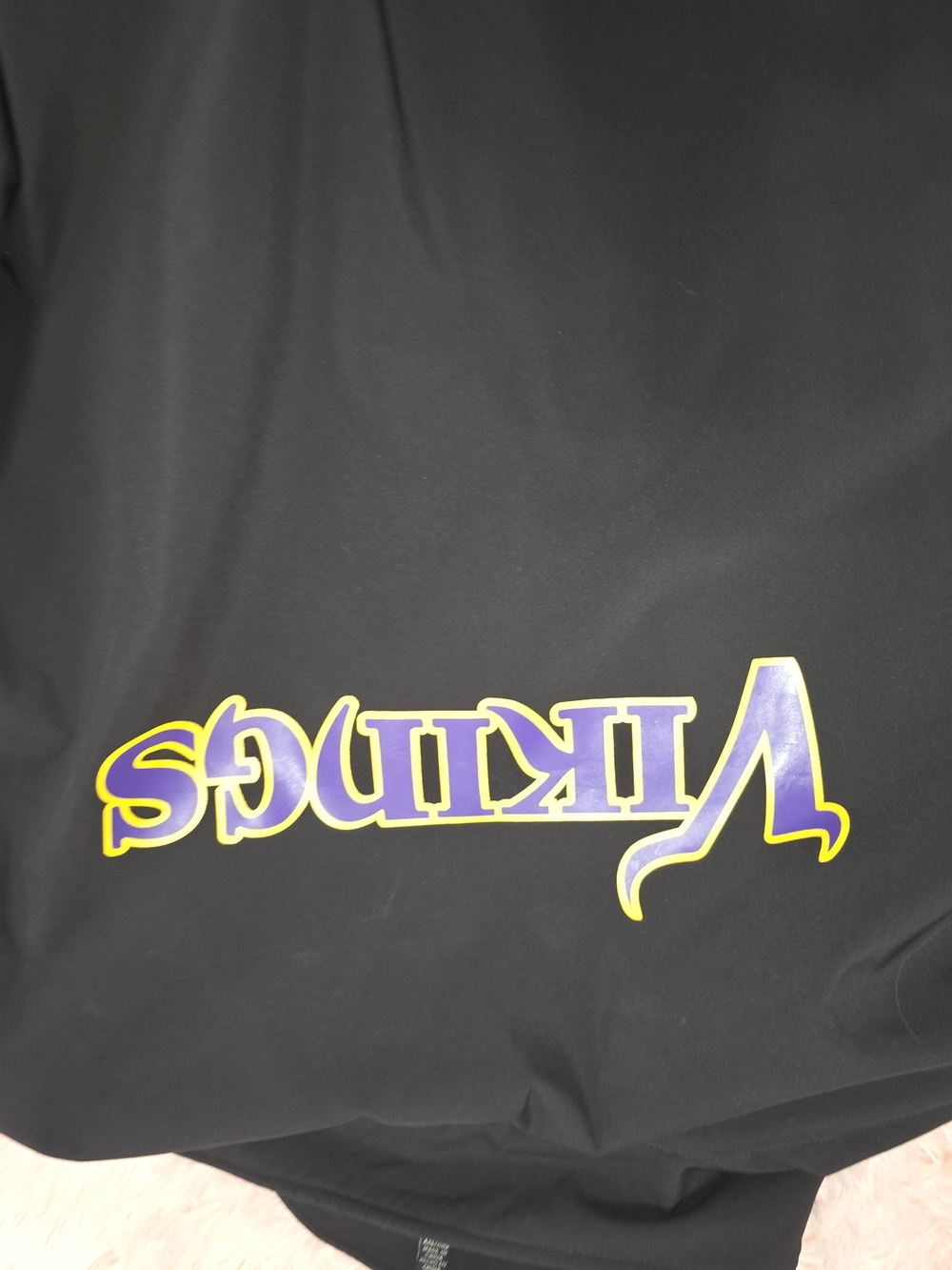 NFL Men's Black Swim Rash Guard with Purple and Yellow Vikings Logo